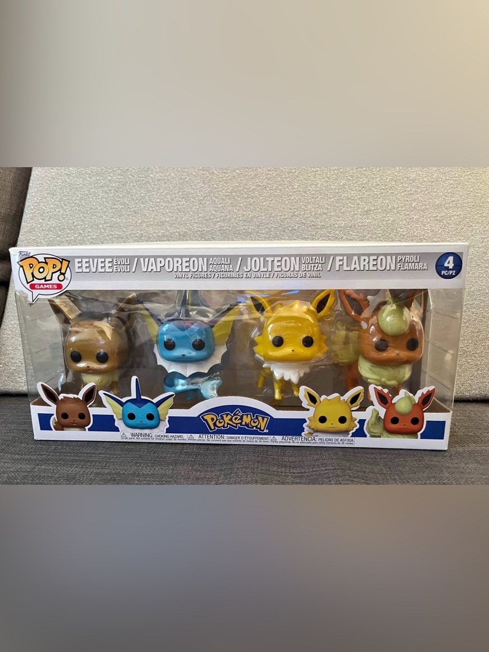 Funko Pop! Pokémon Eevee Evolutions Fig Set - Brown, Blue, Yellow, Orange